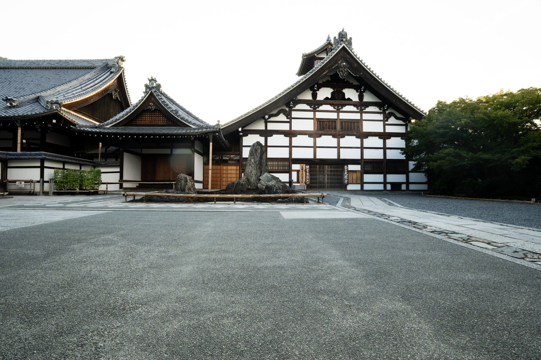 Kyoto morning mist over Japanese temple courtyard